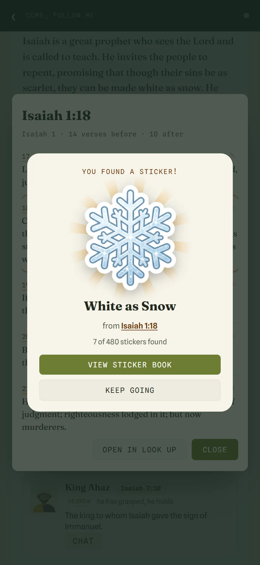 A “You found a sticker!” pop-up showing a snowflake sticker called White as Snow, from Isaiah 1:18, with View sticker book and Keep going buttons.